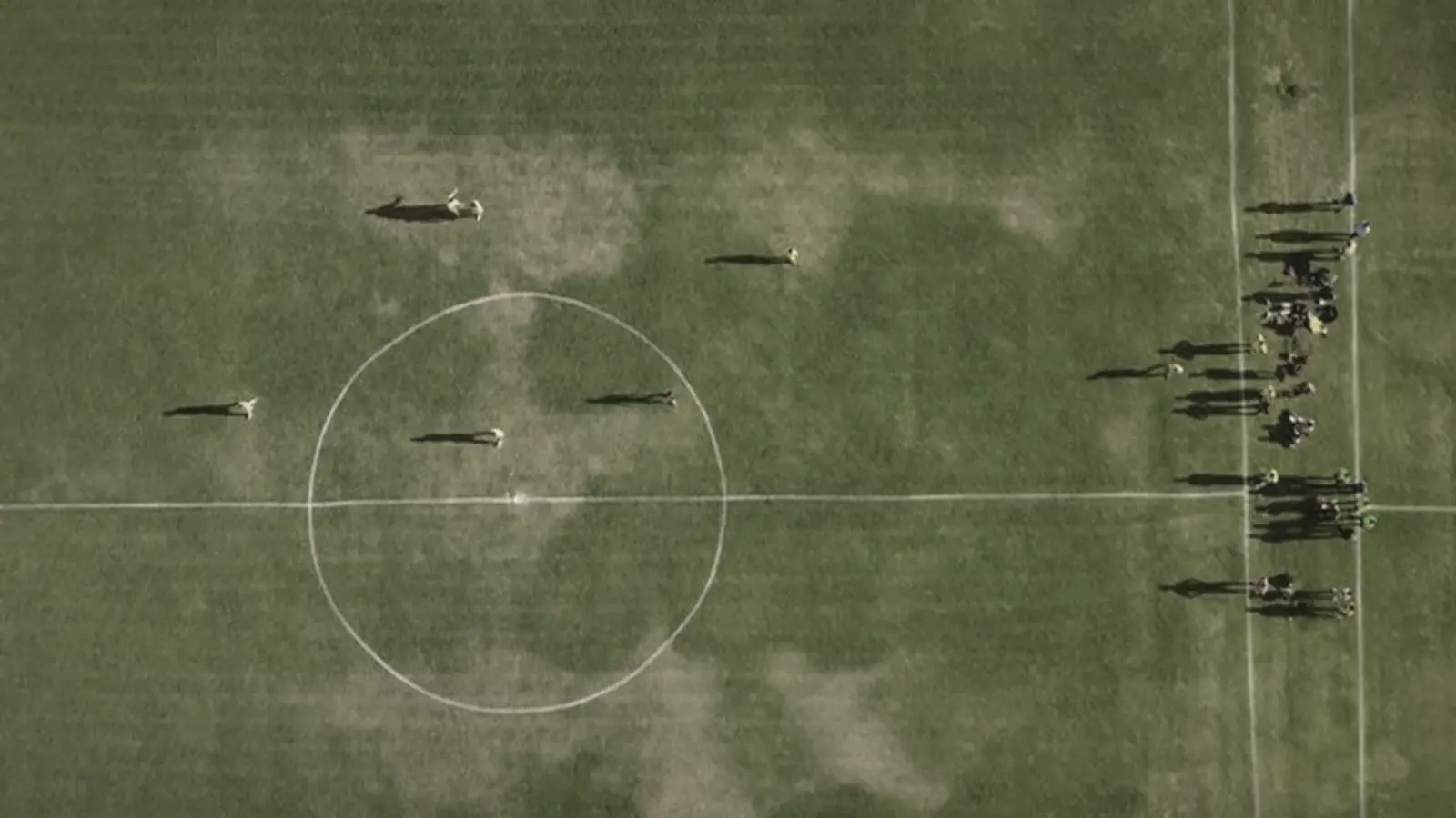 Aerial view of a sports field marked with white lines